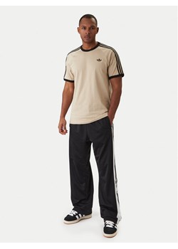 adidas T-Shirt 3-Stripes KE7964 Beżowy Regular Fit ze sklepu MODIVO w kategorii T-shirty męskie - zdjęcie 187781165