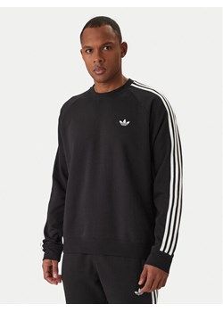 adidas Bluza 3-Stripes KE3550 Czarny Regular Fit ze sklepu MODIVO w kategorii Bluzy męskie - zdjęcie 187803057