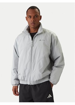 adidas Kurtka przejściowa Moon Boot JM8923 Szary Loose Fit ze sklepu MODIVO w kategorii Kurtki męskie - zdjęcie 187828197