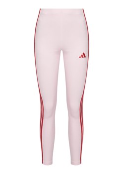 adidas Legginsy Essentials 3-Stripes KC5180 Różowy Slim Fit ze sklepu MODIVO w kategorii Spodnie damskie - zdjęcie 187831006