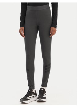 adidas Legginsy Future Icons 3-Stripes KD7667 Szary Slim Fit ze sklepu MODIVO w kategorii Spodnie damskie - zdjęcie 187853018