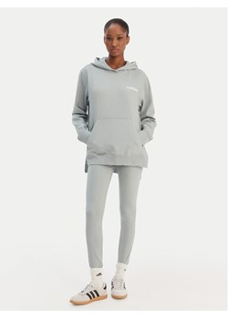 adidas Komplet bluza i legginsy Leisure KB8448 Zielony Regular Fit ze sklepu MODIVO w kategorii Bluzy damskie - zdjęcie 187854066