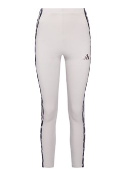 adidas Legginsy Seasonal Essentials Leopard Print KC3883 Fioletowy Slim Fit ze sklepu MODIVO w kategorii Spodnie damskie - zdjęcie 187855819