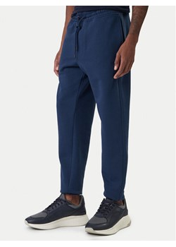 BOSS Spodnie dresowe Sechup 50533392 Niebieski Regular Fit ze sklepu MODIVO w kategorii Spodnie męskie - zdjęcie 187857536