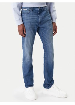 Calvin Klein Jeans Jeansy LV04RE784G Niebieski Skinny Fit ze sklepu MODIVO w kategorii Jeansy męskie - zdjęcie 187857568