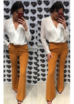 Rozszerzane spodnie typu dzwony musztardowe ze sklepu intimiti.pl w kategorii Spodnie damskie - zdjęcie 187909028