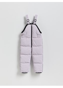 Reserved - Gumowane spodnie na szelkach - lawendowy ze sklepu Reserved w kategorii Spodnie dziewczęce - zdjęcie 187909776