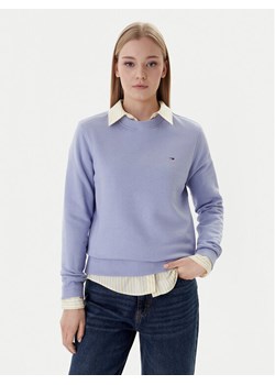 Tommy Jeans Bluza Flag DW0DW19959 Niebieski Regular Fit ze sklepu MODIVO w kategorii Bluzy damskie - zdjęcie 187919349