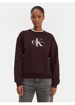 Calvin Klein Jeans Bluza Monologo LV047B234G Brązowy Regular Fit ze sklepu MODIVO w kategorii Bluzy damskie - zdjęcie 187922919