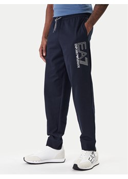 EA7 Emporio Armani Spodnie dresowe 7M001316 AF13512 UB102 Granatowy Regular Fit ze sklepu MODIVO w kategorii Spodnie męskie - zdjęcie 187934155
