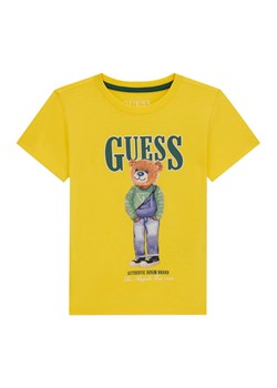 Guess T-Shirt N6RI05 K8HM4 Żółty Regular Fit ze sklepu MODIVO w kategorii T-shirty chłopięce - zdjęcie 187964447