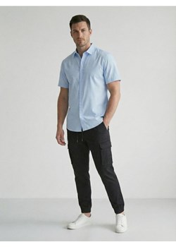 Sinsay - Spodnie jogger cargo ze wzorem moro - czarny ze sklepu Sinsay w kategorii Spodnie męskie - zdjęcie 187966108