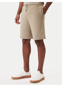 Guess Szorty sportowe Z6RD06 KAIJ1 Beżowy Regular Fit ze sklepu MODIVO w kategorii Spodenki męskie - zdjęcie 187976169