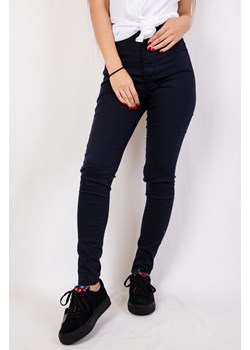 Granatowe spodnie skinny jeans z wysokim stanem ze sklepu olika.com.pl w kategorii Jeansy damskie - zdjęcie 187986616