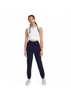 Damskie spodnie treningowe Under Armour Sport High Rise Woven Pant - granatowe ze sklepu Sportstylestory.com w kategorii Spodnie damskie - zdjęcie 187997135