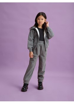 Reserved - Spodnie dresowe z połyskiem - ciemnoszary ze sklepu Reserved w kategorii Spodnie dziewczęce - zdjęcie 188001335