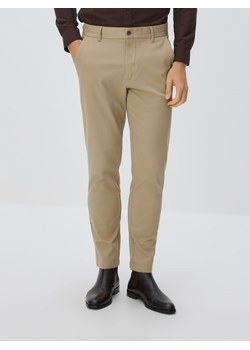 Reserved - Bawełniane spodnie slim fit - beżowy ze sklepu Reserved w kategorii Spodnie męskie - zdjęcie 188003075