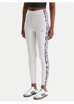 adidas Legginsy Seasonal Essentials Leopard Print KC3883 Fioletowy Slim Fit ze sklepu MODIVO w kategorii Spodnie damskie - zdjęcie 188013399