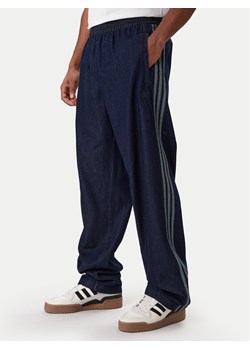 adidas Jeansy adicolor Denim Stone JX6459 Niebieski Regular Fit ze sklepu MODIVO w kategorii Jeansy męskie - zdjęcie 188013475