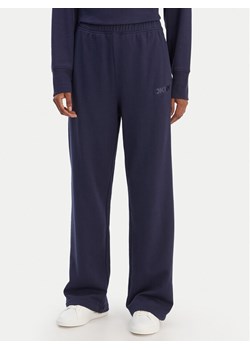 DKNY Sport Spodnie dresowe DP6P3795 Granatowy Regular Fit ze sklepu MODIVO w kategorii Spodnie damskie - zdjęcie 188013599