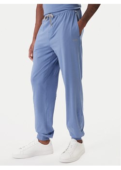 BOSS Spodnie dresowe Mix&Match 50515305 Błękitny Regular Fit ze sklepu MODIVO w kategorii Spodnie męskie - zdjęcie 188015467