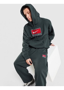 NIKE SPODNIE M NL SOLO SWSH BB OH PANT GFX ze sklepu JD Sports  w kategorii Spodnie męskie - zdjęcie 188016639