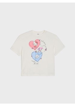 Sinsay - Bawełniana koszulka z nadrukiem Hello Kitty - kremowy ze sklepu Sinsay w kategorii Bluzki dziewczęce - zdjęcie 188020445