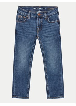 Guess Jeansy N2RA08 D4GV0 Niebieski Skinny Fit ze sklepu MODIVO w kategorii Spodnie dziewczęce - zdjęcie 188020495