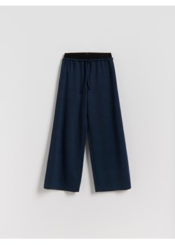 Reserved - Luźne spodnie w kratę - wielobarwny ze sklepu Reserved w kategorii Spodnie dziewczęce - zdjęcie 188036697