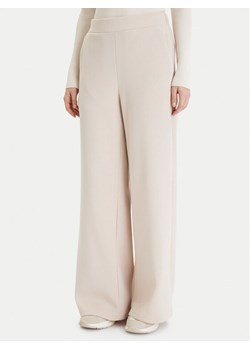 Vero Moda Spodnie dresowe Daisy 10338102 Beżowy Wide Leg ze sklepu MODIVO w kategorii Spodnie damskie - zdjęcie 188041448