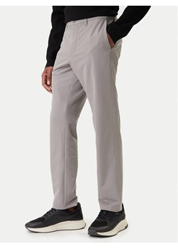 BOSS Spodnie materiałowe T_Commuter 50534303 Beżowy Slim Fit ze sklepu MODIVO w kategorii Spodnie męskie - zdjęcie 188051565