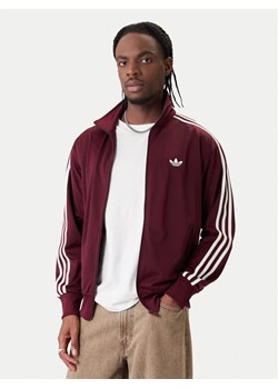adidas Bluza Firebird KE1646 Bordowy Loose Fit ze sklepu MODIVO w kategorii Bluzy męskie - zdjęcie 188062117