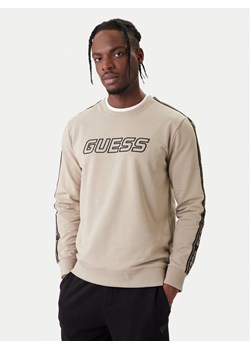 Guess Bluza Z4GQ24 K6ZS1 Beżowy Regular Fit ze sklepu MODIVO w kategorii Bluzy męskie - zdjęcie 188070316