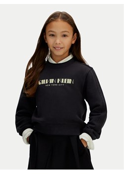 Calvin Klein Jeans Bluza IG0IG03069 Czarny Regular Fit ze sklepu MODIVO w kategorii Bluzy dziewczęce - zdjęcie 188074599