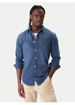 Tommy Jeans Koszula DM0DM22303 Niebieski Regular Fit ze sklepu MODIVO w kategorii Koszule męskie - zdjęcie 188074636