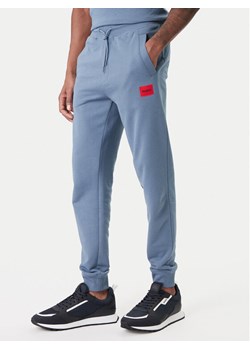 HUGO Spodnie dresowe Doak212 50447963 Granatowy Regular Fit ze sklepu MODIVO w kategorii Spodnie męskie - zdjęcie 188081328