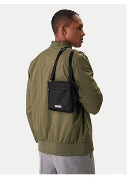 Saszetka Calvin Klein Sleek Slim Flatpack LV04D3234G Czarny ze sklepu eobuwie.pl w kategorii Saszetki - zdjęcie 188098378