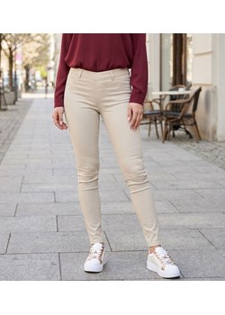 Wyszczuplające lśniące legginsy beżowe /H2 UB857 G8-6/ ze sklepu Pantofelek24.pl w kategorii Spodnie damskie - zdjęcie 188100947