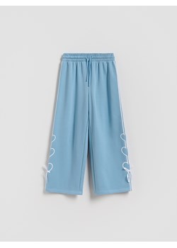 Reserved - Spodnie dresowe z kokardkami - jasnoturkusowy ze sklepu Reserved w kategorii Spodnie dziewczęce - zdjęcie 188103799