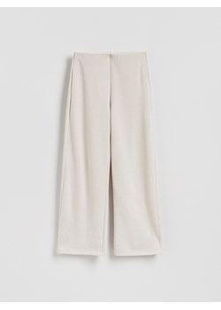 Reserved - Dzianinowe spodnie z bawełną - beżowy ze sklepu Reserved w kategorii Spodnie damskie - zdjęcie 188110746