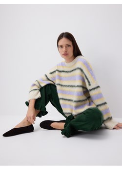 Reserved - Spodnie z falbanką - ciemnozielony ze sklepu Reserved w kategorii Spodnie damskie - zdjęcie 188110868