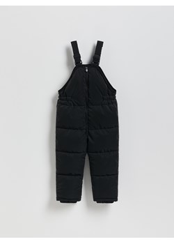 Reserved - Gumowane spodnie na szelkach - czarny ze sklepu Reserved w kategorii Spodnie dziewczęce - zdjęcie 188110998