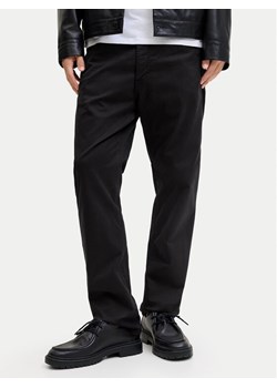 Jack & Jones Spodnie materiałowe Clark Finn 12293328 Czarny Regular Fit ze sklepu MODIVO w kategorii Spodnie męskie - zdjęcie 188112255