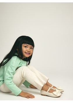 Reserved - Dzianinowe spodnie flare - kremowy ze sklepu Reserved w kategorii Bluzy dziewczęce - zdjęcie 188114749