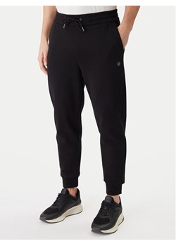 BOSS Spodnie dresowe 50555853 Czarny Regular Fit ze sklepu MODIVO w kategorii Spodnie męskie - zdjęcie 188115306