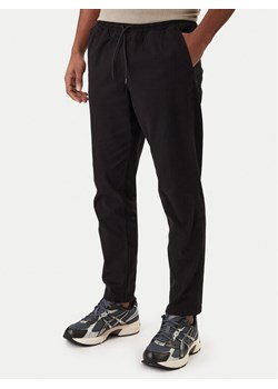 Jack & Jones Joggery Stace Dylan 12288472 Czarny Regular Fit ze sklepu MODIVO w kategorii Spodnie męskie - zdjęcie 188118528