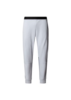 Spodnie męskie The North Face Mountain Athletics 0A893SA1S1 - niebieskie ze sklepu streetstyle24.pl w kategorii Spodnie męskie - zdjęcie 188121559