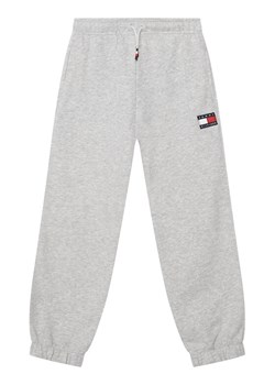 Tommy Hilfiger Spodnie dresowe KS0KS00715 Szary Regular Fit ze sklepu MODIVO w kategorii Spodnie chłopięce - zdjęcie 188137926