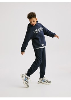 Reserved - Bawełniane spodnie jogger - granatowy ze sklepu Reserved w kategorii Spodnie chłopięce - zdjęcie 188141848