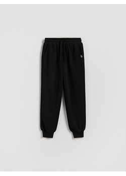 Reserved - Bawełniane spodnie jogger - czarny ze sklepu Reserved w kategorii Spodnie chłopięce - zdjęcie 188141858